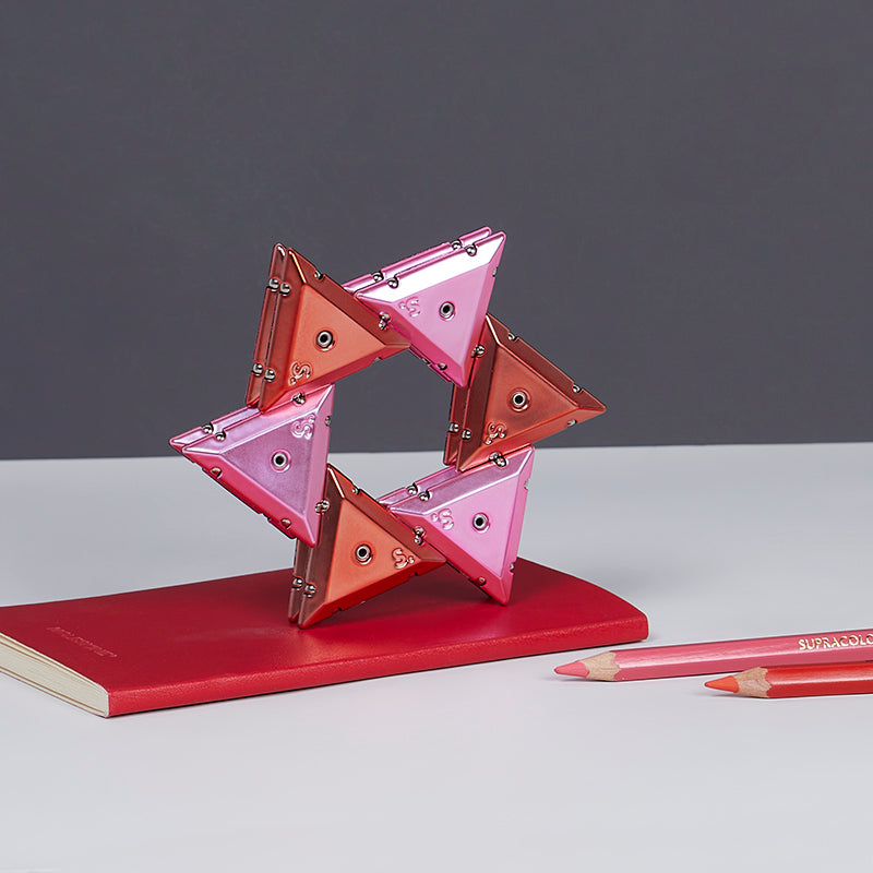 Speks Geode magnetic fidget pyramid desk toy chrome pink
